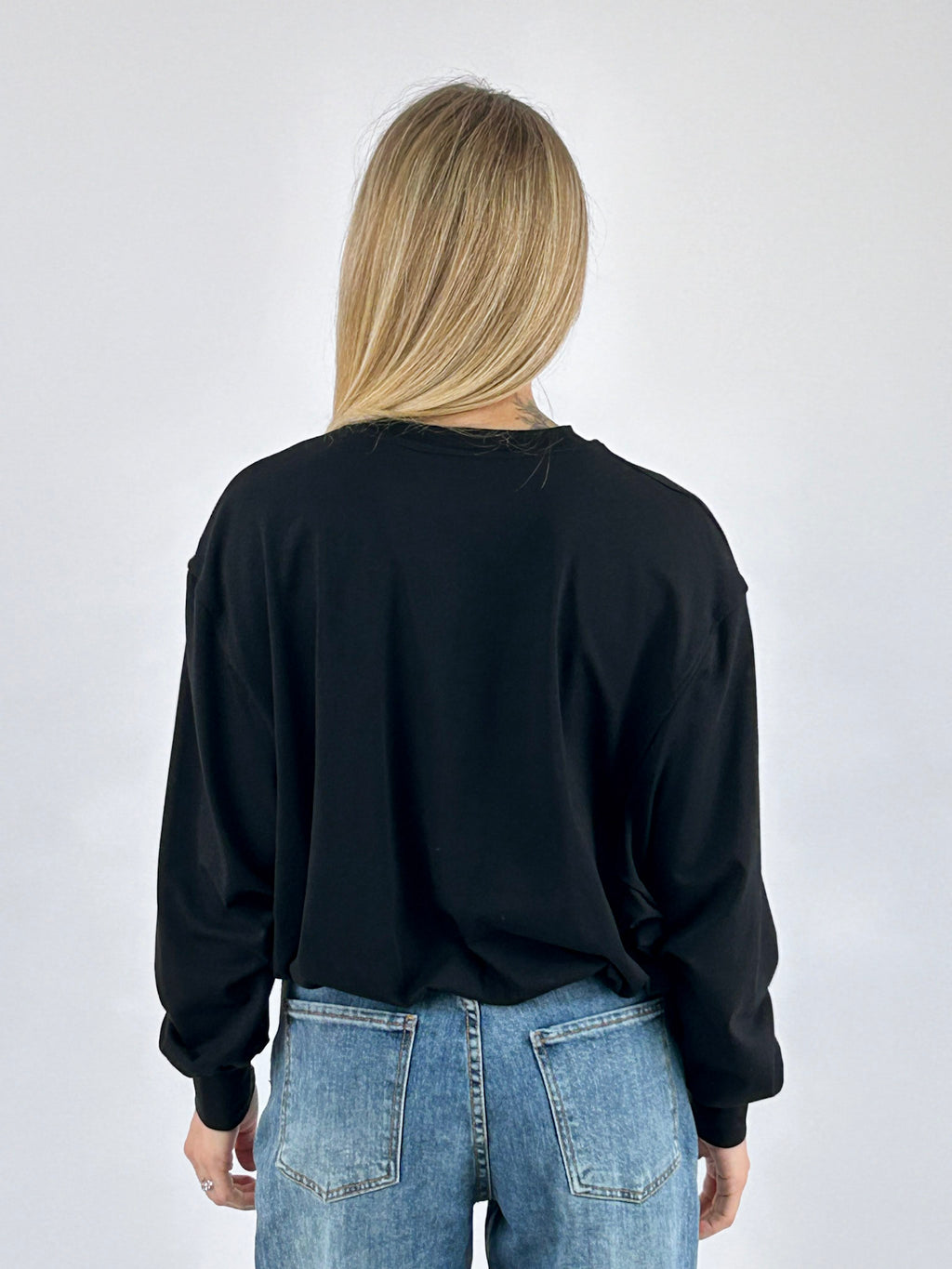 Maglia donna girocollo corta con fondo arricciato nero - vista retro
