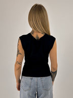 Canotta Basic da donna in tessuto morbido elasticizzato con scollo ampio. vista retro