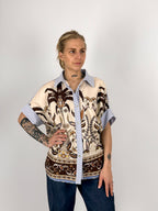 Camicia donna over in cotone fantasia con spalla scesa e vestibilità ampia - vista frontale