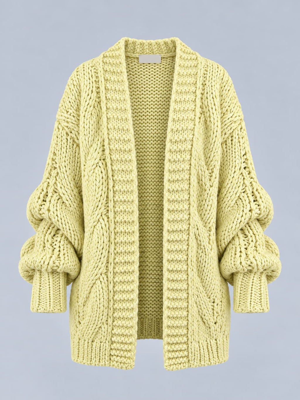 Cardigan donna lungo in maglia grossa con lavorazione a trecce e spalla scesa giallo - vista frontale gost