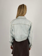 Giacca Como corta da donna in denim chiaro con bottoni frontali e tasche -  vista retro