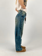 Jeans balloon donna a vita alta con gamba ampia e vestibilità morbida. vista laterale