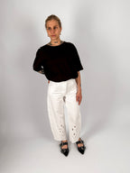Jeans donna bianchi in cotone con dettagli traforati sul fondo e gamba dritta - outif completo