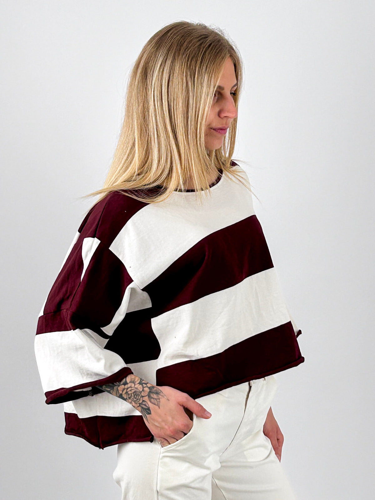Maglia donna a righe bordeaux e panna - vista laterale