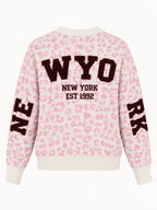 Maglione donna animalier rosa con maxi scritta New York - vista retro