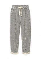 Pantalone donna Verde militare rigato con coulisse in vita e vestibilità morbida. immagine gost