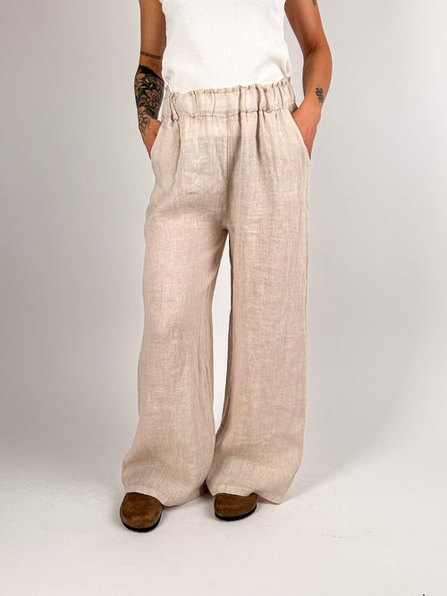 Pantalone donna in lino con vita elasticizzata e gamba ampia - vista frontale beige