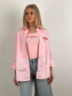 set camicia over e canotta elasticizzata rosa  vista frontale