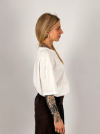 T-shirt donna bianco in cotone con vestibilità morbida e spalla scesa. -vista laterale